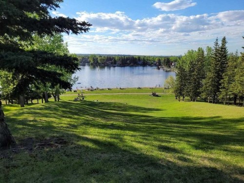 136 Midlawn Close Se, Calgary, AB - Outdoor With Body Of Water With View