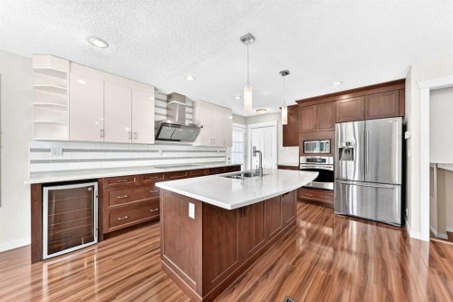 136 Midlawn Close Se, Calgary, AB - Indoor Photo Showing Kitchen With Upgraded Kitchen