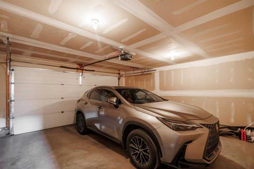 124 Walgrove Cove Se, Calgary, AB - Indoor Photo Showing Garage