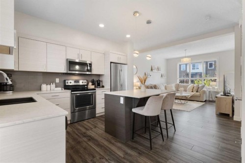 124 Walgrove Cove Se, Calgary, AB - Indoor Photo Showing Kitchen With Stainless Steel Kitchen With Double Sink With Upgraded Kitchen