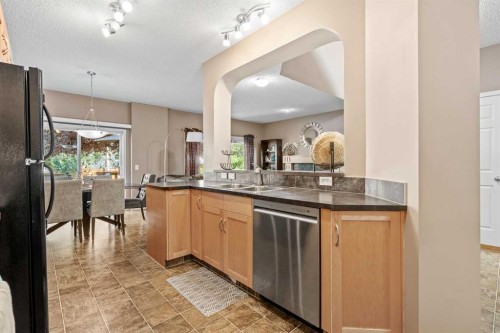 52 Copperfield Close Se, Calgary, AB - Indoor Photo Showing Kitchen With Double Sink