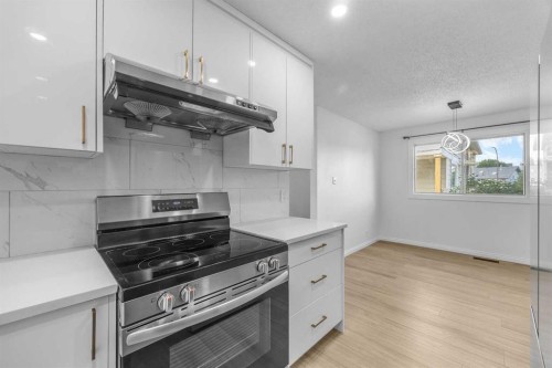 155 Sandarac Way Nw, Calgary, AB - Indoor Photo Showing Kitchen