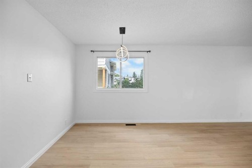 155 Sandarac Way Nw, Calgary, AB - Indoor Photo Showing Other Room