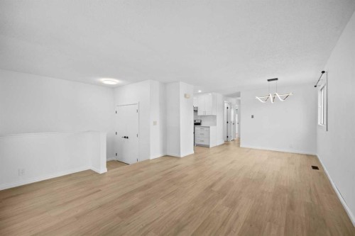 155 Sandarac Way Nw, Calgary, AB - Indoor Photo Showing Other Room