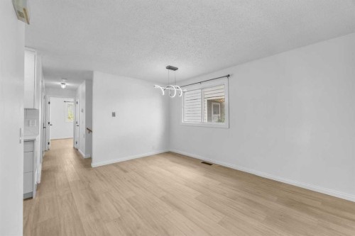 155 Sandarac Way Nw, Calgary, AB - Indoor Photo Showing Other Room