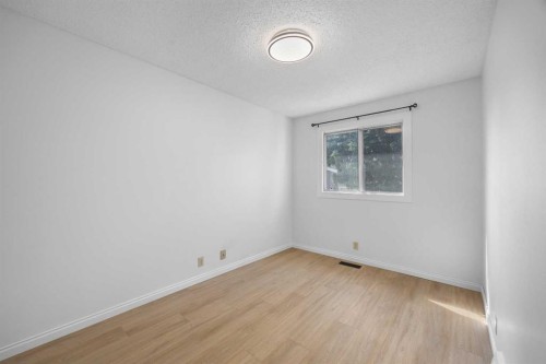 155 Sandarac Way Nw, Calgary, AB - Indoor Photo Showing Other Room