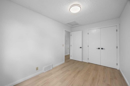 155 Sandarac Way Nw, Calgary, AB - Indoor Photo Showing Other Room