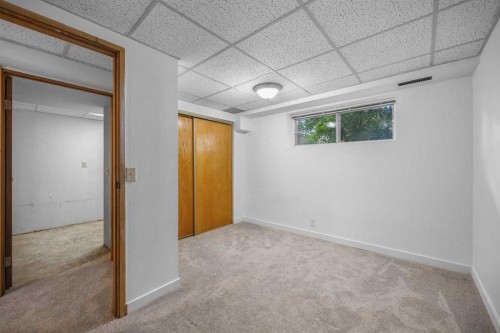 155 Sandarac Way Nw, Calgary, AB - Indoor Photo Showing Other Room
