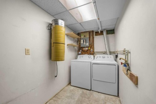 155 Sandarac Way Nw, Calgary, AB - Indoor Photo Showing Laundry Room