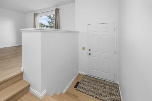 155 Sandarac Way Nw, Calgary, AB - Indoor Photo Showing Other Room