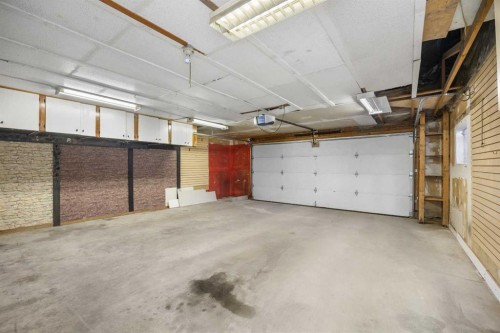 155 Sandarac Way Nw, Calgary, AB - Indoor Photo Showing Garage