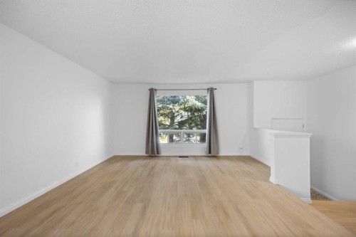 155 Sandarac Way Nw, Calgary, AB - Indoor Photo Showing Other Room
