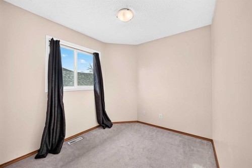 27 Erin Meadow Crescent Se, Calgary, AB - Indoor Photo Showing Other Room