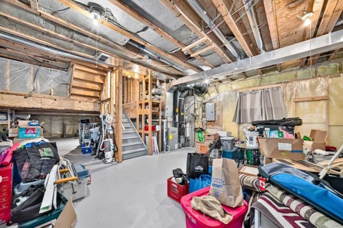 27 Erin Meadow Crescent Se, Calgary, AB - Indoor Photo Showing Basement