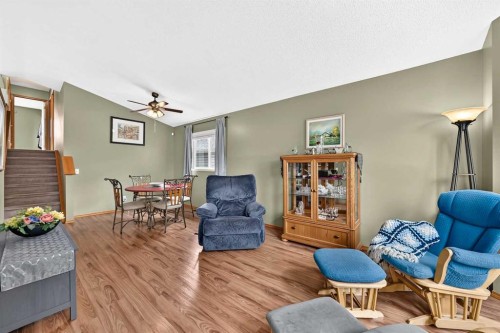 27 Erin Meadow Crescent Se, Calgary, AB - Indoor Photo Showing Living Room