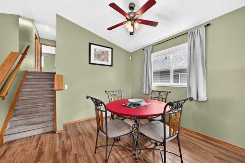 27 Erin Meadow Crescent Se, Calgary, AB - Indoor Photo Showing Dining Room