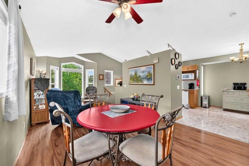 27 Erin Meadow Crescent Se, Calgary, AB - Indoor Photo Showing Dining Room