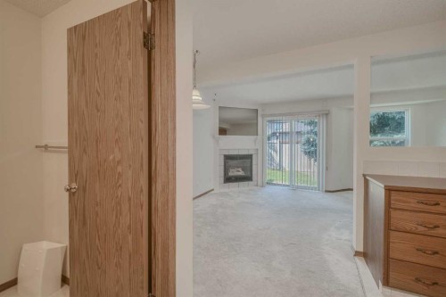 15 Harvest Glen Heights Ne, Calgary, AB - Indoor With Fireplace