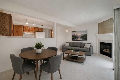 15 Harvest Glen Heights Ne, Calgary, AB - Indoor With Fireplace