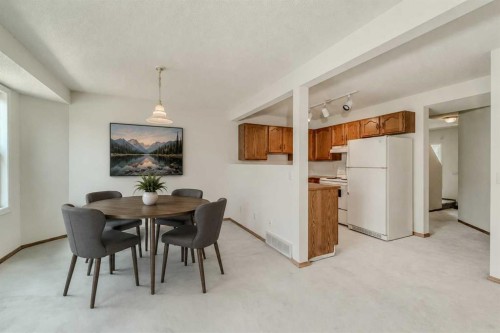 15 Harvest Glen Heights Ne, Calgary, AB - Indoor Photo Showing Dining Room
