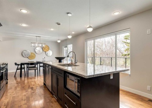 176 Mapleburn Drive Se, Calgary, AB - Indoor Photo Showing Kitchen With Upgraded Kitchen