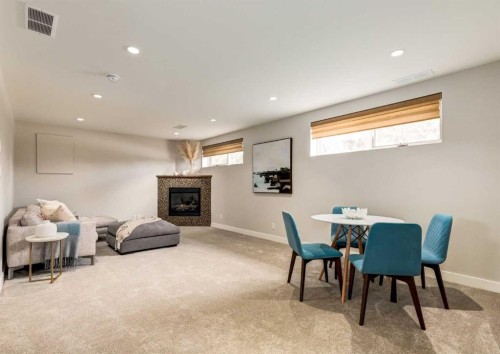176 Mapleburn Drive Se, Calgary, AB - Indoor With Fireplace