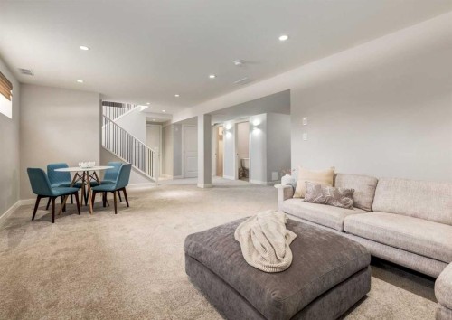 176 Mapleburn Drive Se, Calgary, AB - Indoor Photo Showing Living Room