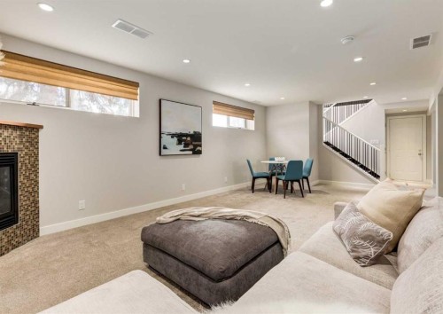 176 Mapleburn Drive Se, Calgary, AB - Indoor With Fireplace