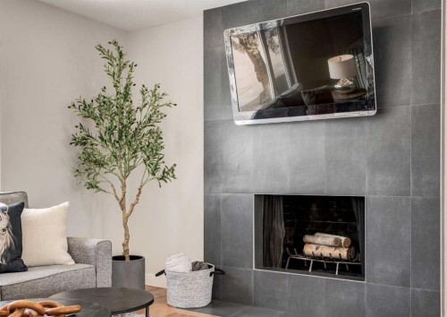 176 Mapleburn Drive Se, Calgary, AB - Indoor Photo Showing Other Room With Fireplace