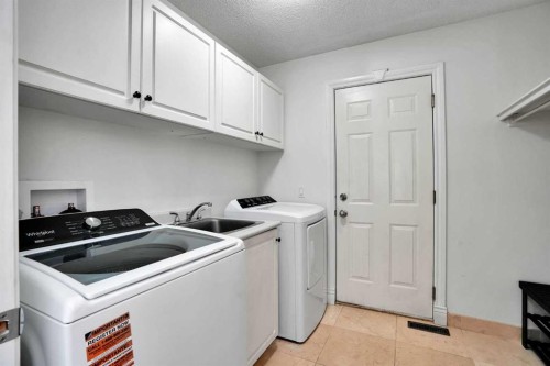 132 Evergreen Close Sw, Calgary, AB - Indoor Photo Showing Laundry Room