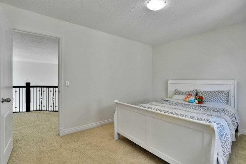 132 Evergreen Close Sw, Calgary, AB - Indoor Photo Showing Bedroom