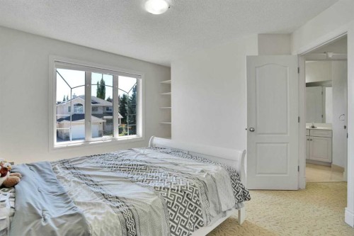 132 Evergreen Close Sw, Calgary, AB - Indoor Photo Showing Bedroom