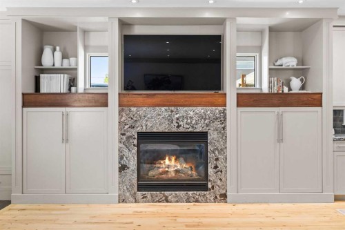 211 32 Avenue Nw, Calgary, AB - Indoor Photo Showing Living Room With Fireplace