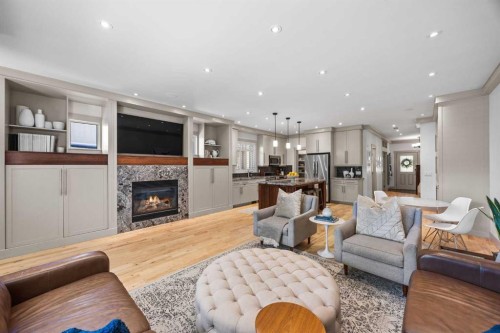 211 32 Avenue Nw, Calgary, AB - Indoor Photo Showing Living Room With Fireplace