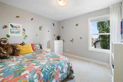 94 Masters Mews Se, Calgary, AB - Indoor Photo Showing Bedroom