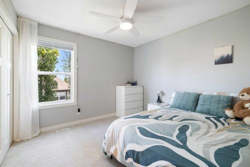 94 Masters Mews Se, Calgary, AB - Indoor Photo Showing Bedroom