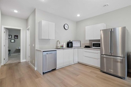 94 Masters Mews Se, Calgary, AB - Indoor Photo Showing Kitchen With Stainless Steel Kitchen