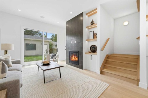 4507 17 Street Sw, Calgary, AB - Indoor Photo Showing Living Room With Fireplace