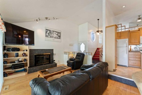 79 Templegreen Place Ne, Calgary, AB - Indoor Photo Showing Living Room With Fireplace