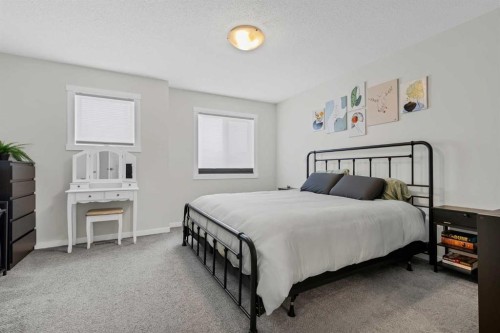 162 Chinook Gate Boulevard Sw, Airdrie, AB - Indoor Photo Showing Bedroom
