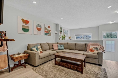 162 Chinook Gate Boulevard Sw, Airdrie, AB - Indoor Photo Showing Living Room
