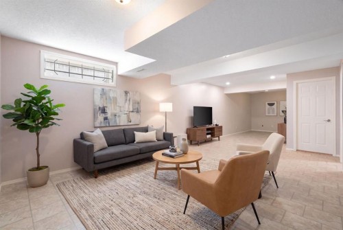 77 Tararidge Circle Ne, Calgary, AB - Indoor Photo Showing Living Room