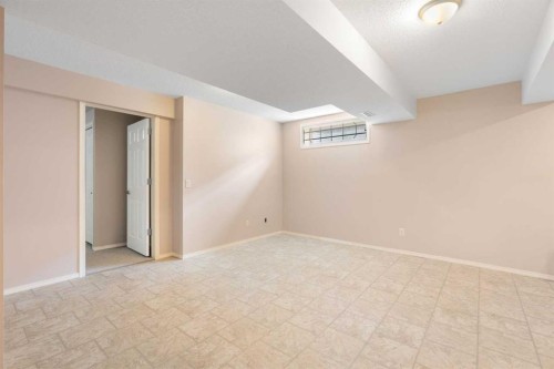 77 Tararidge Circle Ne, Calgary, AB - Indoor Photo Showing Other Room