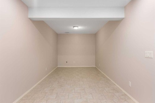 77 Tararidge Circle Ne, Calgary, AB - Indoor Photo Showing Other Room