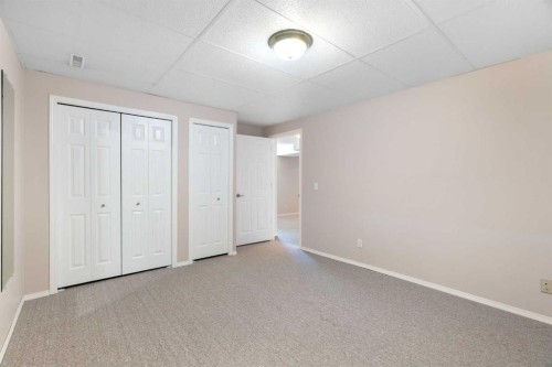 77 Tararidge Circle Ne, Calgary, AB - Indoor Photo Showing Other Room