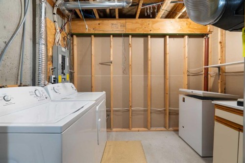 77 Tararidge Circle Ne, Calgary, AB - Indoor Photo Showing Laundry Room