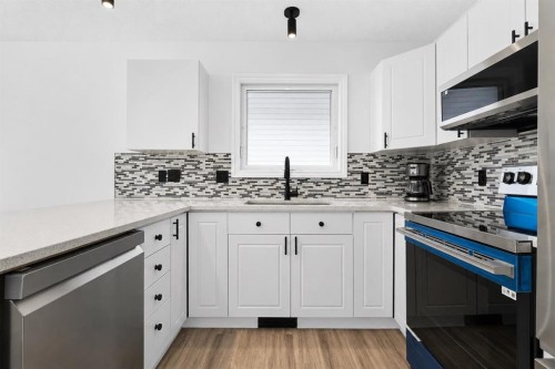 250 Bridlewood Circle Sw, Calgary, AB - Indoor Photo Showing Kitchen With Upgraded Kitchen