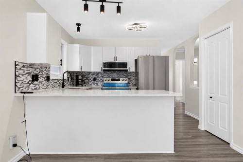 250 Bridlewood Circle Sw, Calgary, AB - Indoor Photo Showing Kitchen With Upgraded Kitchen