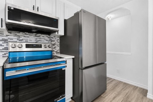 250 Bridlewood Circle Sw, Calgary, AB - Indoor Photo Showing Kitchen With Stainless Steel Kitchen