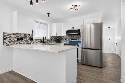 250 Bridlewood Circle Sw, Calgary, AB - Indoor Photo Showing Kitchen With Stainless Steel Kitchen With Upgraded Kitchen
